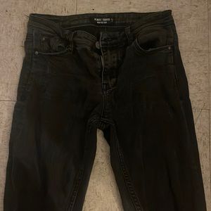 Black with zippers almost famous jeans
